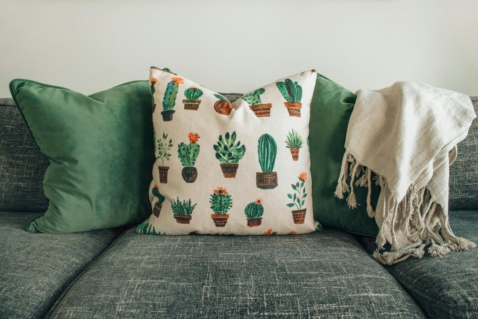 Stylish cushion covers on a sofa setup